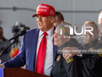 Former President Donald Trump, the Republican presidential nominee, holds a campaign rally at Dodge County Airport in Juneau, Wisconsin, on...