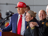 Former President Donald Trump, the Republican presidential nominee, holds a campaign rally at Dodge County Airport in Juneau, Wisconsin, on...