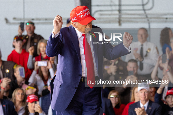 Former President Donald Trump, the Republican presidential nominee, holds a campaign rally at Dodge County Airport in Juneau, Wisconsin, on...