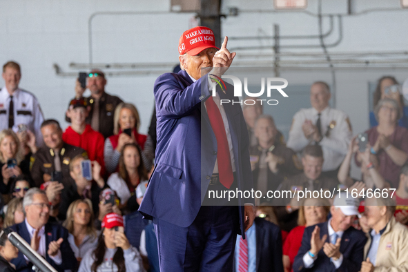 Former President Donald Trump, the Republican presidential nominee, holds a campaign rally at Dodge County Airport in Juneau, Wisconsin, on...