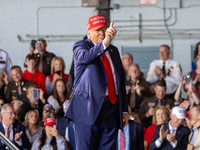 Former President Donald Trump, the Republican presidential nominee, holds a campaign rally at Dodge County Airport in Juneau, Wisconsin, on...