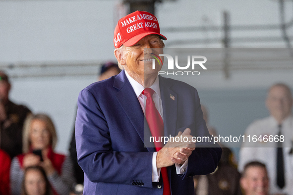 Former President Donald Trump, the Republican presidential nominee, holds a campaign rally at Dodge County Airport in Juneau, Wisconsin, on...