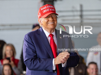 Former President Donald Trump, the Republican presidential nominee, holds a campaign rally at Dodge County Airport in Juneau, Wisconsin, on...