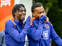 Netherlands players Jeremie Frimpong and Quinten Timber participate in the training and press conference for the Netherlands Nations League...