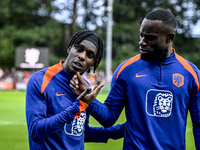 Netherlands players Jeremie Frimpong and Lutsharel Geertruida participate in the training and press conference for the Netherlands Nations L...