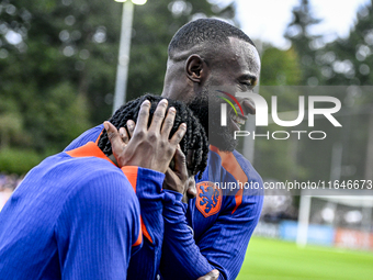 Netherlands players Jeremie Frimpong and Lutsharel Geertruida participate in the training and press conference for the Netherlands Nations L...