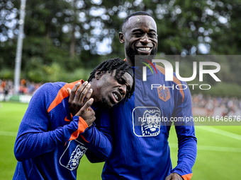 Netherlands players Jeremie Frimpong and Lutsharel Geertruida participate in the training and press conference for the Netherlands Nations L...