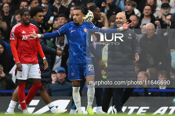 Enzo Maresca, Chelsea manager, smiles during the Premier League match between Chelsea and Nottingham Forest at Stamford Bridge in London, En...