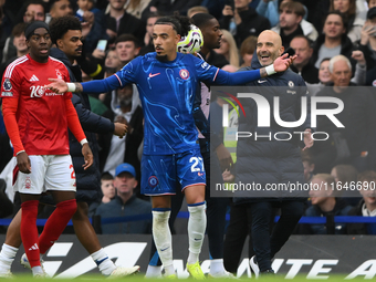 Enzo Maresca, Chelsea manager, smiles during the Premier League match between Chelsea and Nottingham Forest at Stamford Bridge in London, En...