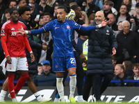 Enzo Maresca, Chelsea manager, smiles during the Premier League match between Chelsea and Nottingham Forest at Stamford Bridge in London, En...