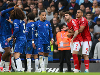 Neco Williams of Nottingham Forest is furious with Marc Cucurella of Chelsea during the Premier League match between Chelsea and Nottingham...