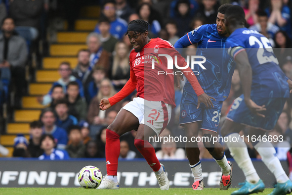 Anthony Elanga of Nottingham Forest is under pressure from Wesley Fofana and Moises Caicedo of Chelsea during the Premier League match betwe...