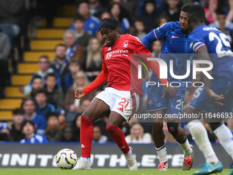 Anthony Elanga of Nottingham Forest is under pressure from Wesley Fofana and Moises Caicedo of Chelsea during the Premier League match betwe...