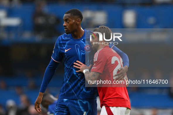 Tosin Adarabioyo of Chelsea and Jota Silva of Nottingham Forest follow during the Premier League match between Chelsea and Nottingham Forest...