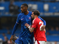 Tosin Adarabioyo of Chelsea and Jota Silva of Nottingham Forest follow during the Premier League match between Chelsea and Nottingham Forest...