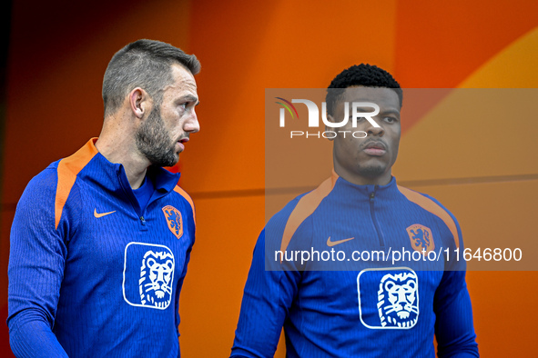 Netherlands players Stefan de Vrij and Denzel Dumfries participate in the training and press conference for the Netherlands Nations League s...