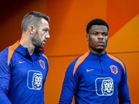 Netherlands players Stefan de Vrij and Denzel Dumfries participate in the training and press conference for the Netherlands Nations League s...