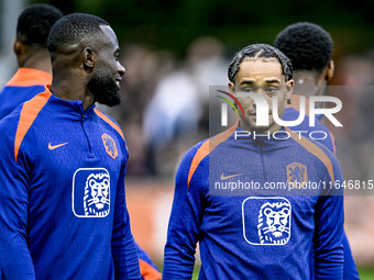 Netherlands players Lutsharel Geertruida and Xavi Simons participate in the training and press conference for the Netherlands Nations League...