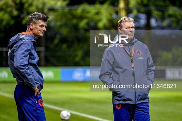 Netherlands assistant trainer Wim Jonk and Netherlands trainer coach Ronald Koeman are present during the training and press conference for...