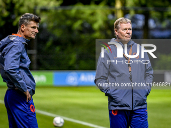 Netherlands assistant trainer Wim Jonk and Netherlands trainer coach Ronald Koeman are present during the training and press conference for...