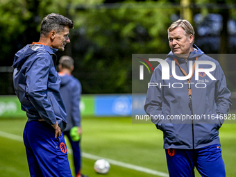 Netherlands assistant trainer Wim Jonk and Netherlands trainer coach Ronald Koeman are present during the training and press conference for...