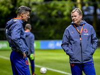 Netherlands assistant trainer Wim Jonk and Netherlands trainer coach Ronald Koeman are present during the training and press conference for...