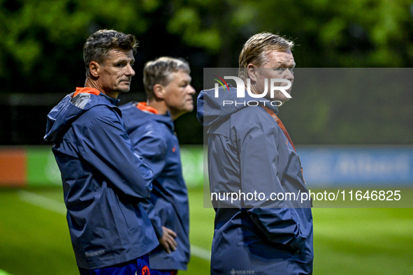 Netherlands assistant trainer Wim Jonk, Netherlands trainer coach Ronald Koeman, and Netherlands assistant trainer Erwin Koeman are present...