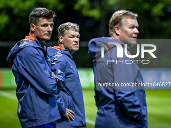 Netherlands assistant trainer Wim Jonk, Netherlands trainer coach Ronald Koeman, and Netherlands assistant trainer Erwin Koeman are present...