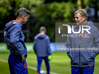 Netherlands assistant trainer Wim Jonk and Netherlands trainer coach Ronald Koeman are present during the training and press conference for...