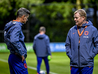 Netherlands assistant trainer Wim Jonk and Netherlands trainer coach Ronald Koeman are present during the training and press conference for...