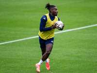 Caleb Okoli attends the Italy training camp session in Coverciano, Florence, on October 7, 2024. (