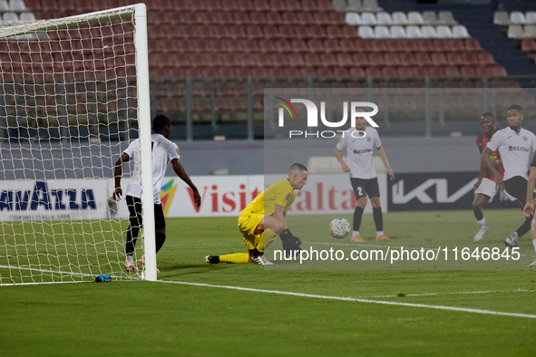 Hugo Sacco, the goalkeeper of Hibernians, is in action during the Malta 360 Sports Premier League soccer match between Hamrun Spartans and H...