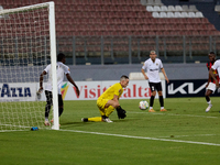 Hugo Sacco, the goalkeeper of Hibernians, is in action during the Malta 360 Sports Premier League soccer match between Hamrun Spartans and H...