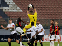 Hugo Sacco, the goalkeeper of Hibernians, is in action during the Malta 360 Sports Premier League soccer match between Hamrun Spartans and H...