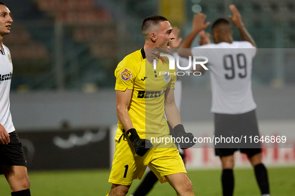 Hugo Sacco, goalkeeper of Hibernians, reacts in celebration after the Malta 360 Sports Premier League soccer match between Hamrun Spartans a...