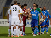 Soccer players from Zabbar St. Patrick and Marsaxlokk perform the ''high-five'' gesture with each other prior to the Malta 360 Sports Premie...