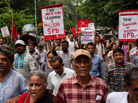 The Palestine Solidarity Committee, Bangladesh holds a rally and mass procession in front of the Raju Memorial Sculpture at TSC of Dhaka Uni...