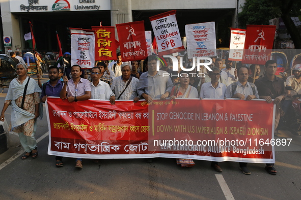 Activists of the Left Democratic Alliance Bangladesh take part in a protest demanding an end to the war in Lebanon and Palestine in Dhaka, B...