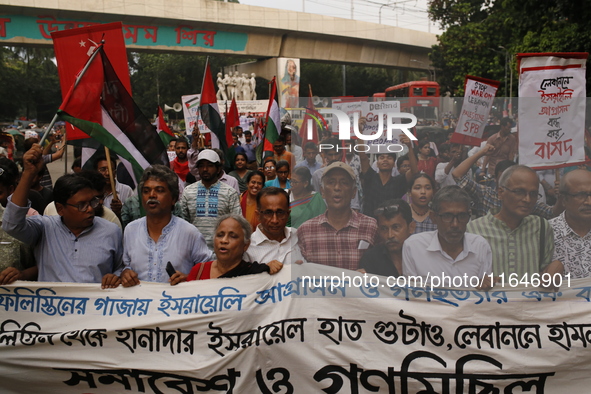 Activists of the Palestine Solidarity Committee, Bangladesh, participate in a protest demanding an end to the war in Lebanon and Palestine i...