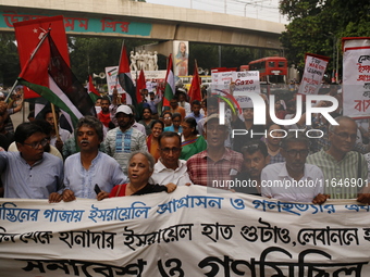 Activists of the Palestine Solidarity Committee, Bangladesh, participate in a protest demanding an end to the war in Lebanon and Palestine i...