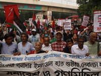 Activists of the Palestine Solidarity Committee, Bangladesh, participate in a protest demanding an end to the war in Lebanon and Palestine i...