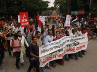 Activists of the Palestine Solidarity Committee, Bangladesh, participate in a protest demanding an end to the war in Lebanon and Palestine i...