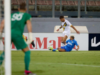 In Ta' Qali, Malta, on October 2, 2024, Diogo Joao Regala De Figueiredo Tavares (back) is challenged by Yuri De Jesus Messias (front) of Mar...