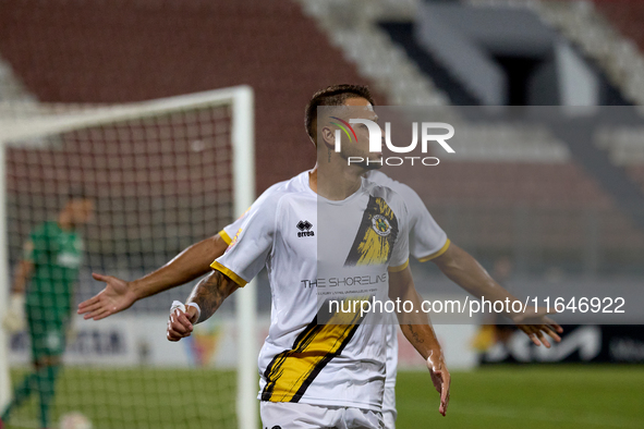 Diogo Joao Regala De Figueiredo Tavares (front) reacts in celebration after scoring the 1-0 goal for his team during the Malta 360 Sports Pr...