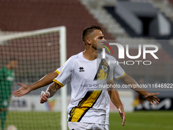 Diogo Joao Regala De Figueiredo Tavares (front) reacts in celebration after scoring the 1-0 goal for his team during the Malta 360 Sports Pr...