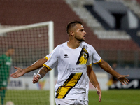 Diogo Joao Regala De Figueiredo Tavares (front) reacts in celebration after scoring the 1-0 goal for his team during the Malta 360 Sports Pr...