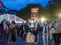 A dozen people gather to mark the first anniversary of Israel's attack on Gaza in Bonn, Germany, on October 7, 2024. (