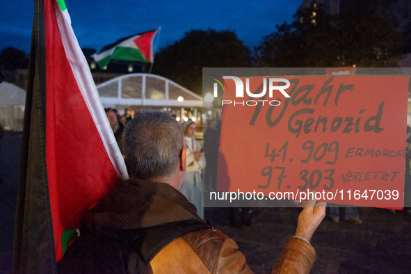 A dozen people gather to mark the first anniversary of Israel's attack on Gaza in Bonn, Germany, on October 7, 2024. 