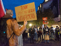 A dozen people gather to mark the first anniversary of Israel's attack on Gaza in Bonn, Germany, on October 7, 2024. (