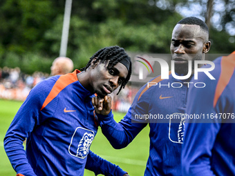 Netherlands players Jeremie Frimpong and Lutsharel Geertruida participate in the training and press conference for the Netherlands Nations L...